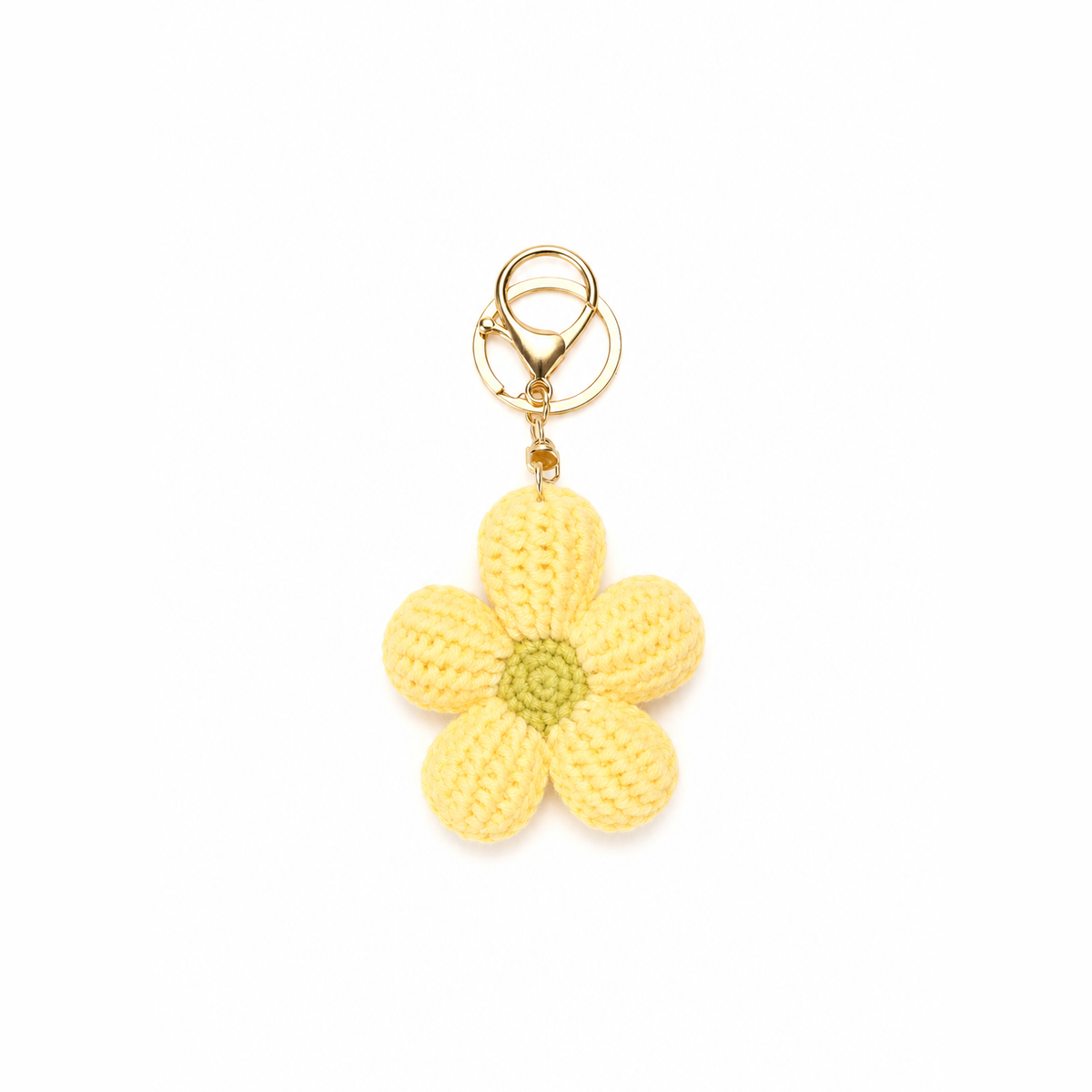 gehaakte bloem sleutelhanger geel, productfoto op witte achtergrond