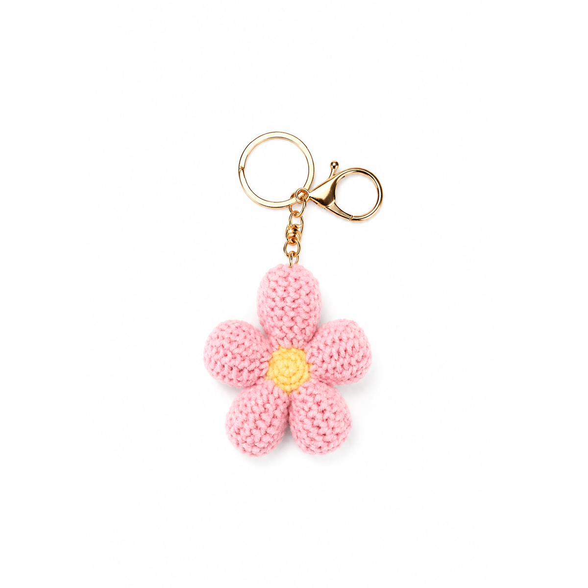 gehaakte bloem sleutelhanger roze, productfoto op witte achtergrond