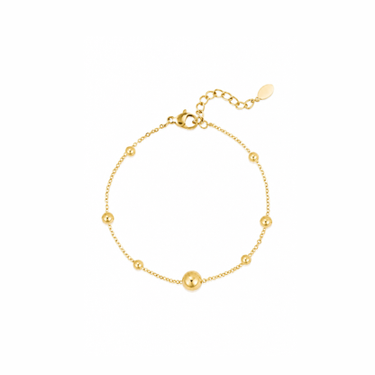 Gouden bolletjes armband van stainless steel, productfoto op witte achtergrond