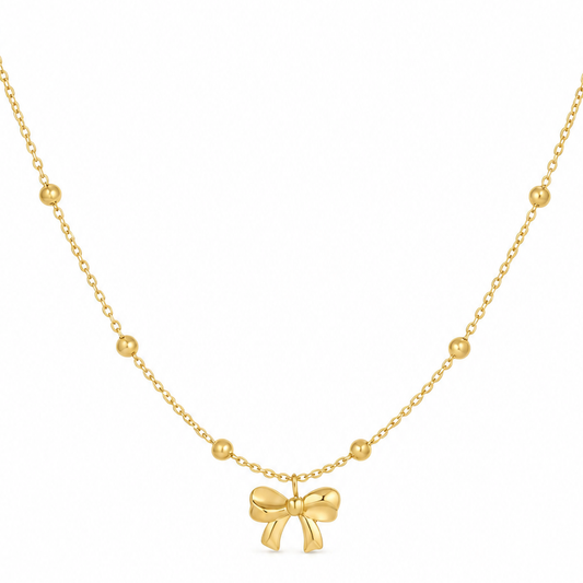 Gouden strikje ketting van stainless steel, productfoto op witte achtergrond