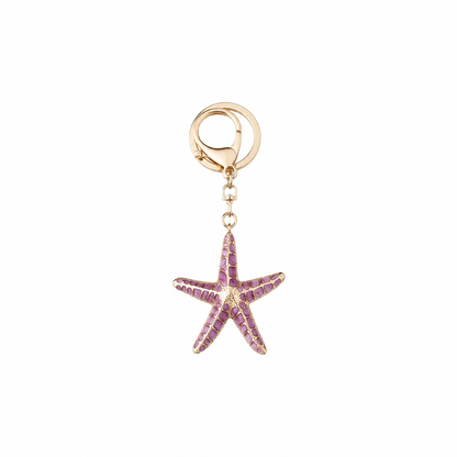 grote zeester sleutelhanger paars, productfoto op witte achtergrond